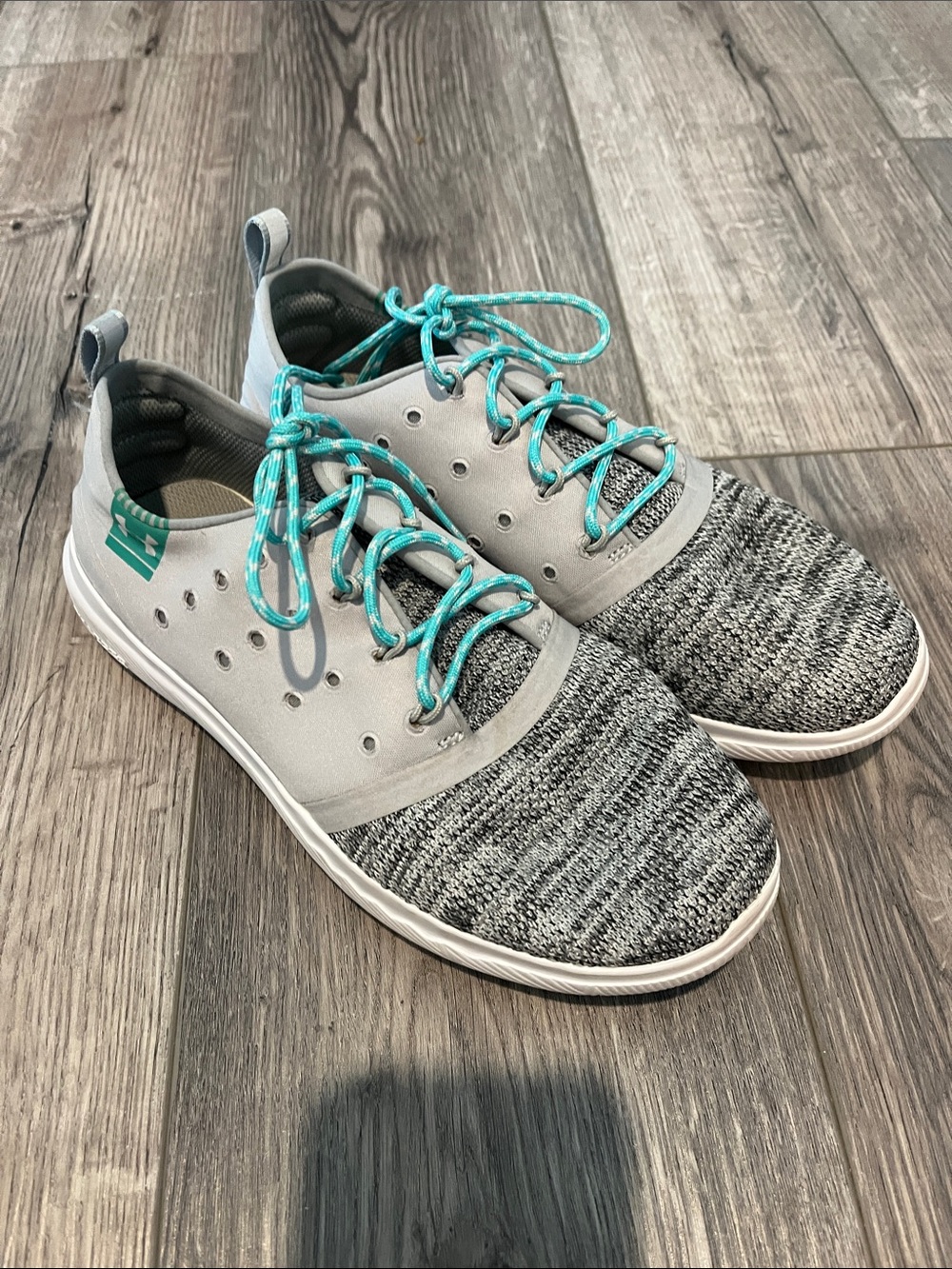 Like new under armour Gray Knit Casual Sneakers with Teal Accents worn twice